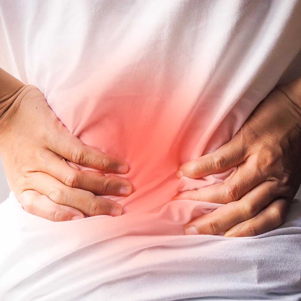 Woman experiencing backpain closeup
