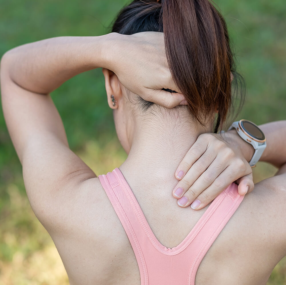 Young Lady Holding Her Neck Injury